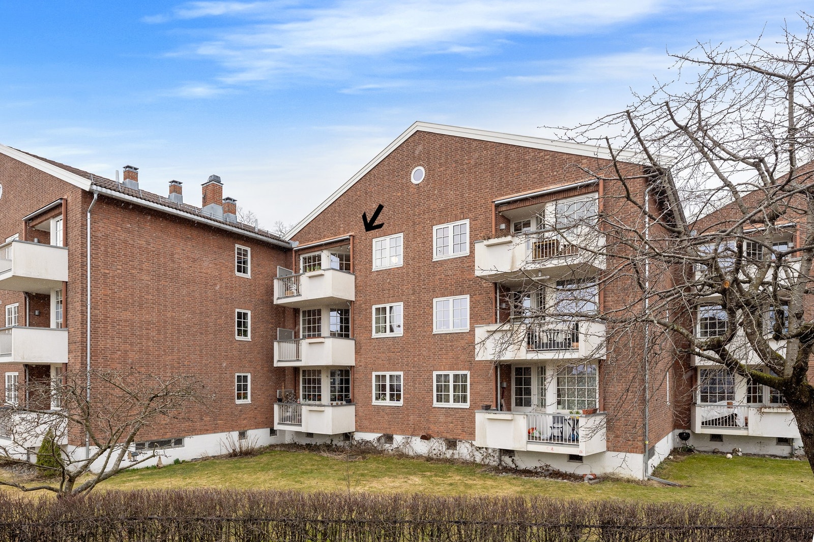 Boligen ligger i øverste leilighetsplan i denne lavblokken Galleribilde