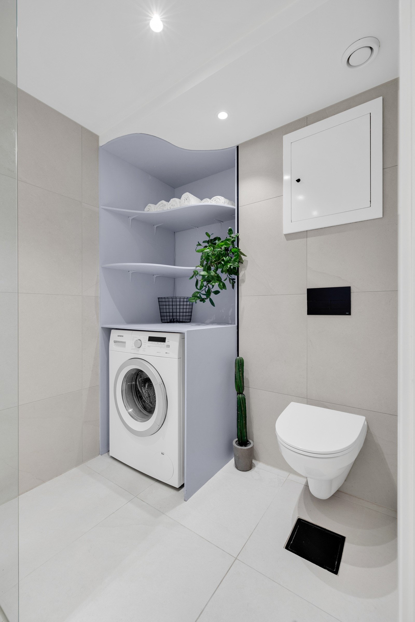 Opplegg til vaskemaskin på baderom Galleribilde