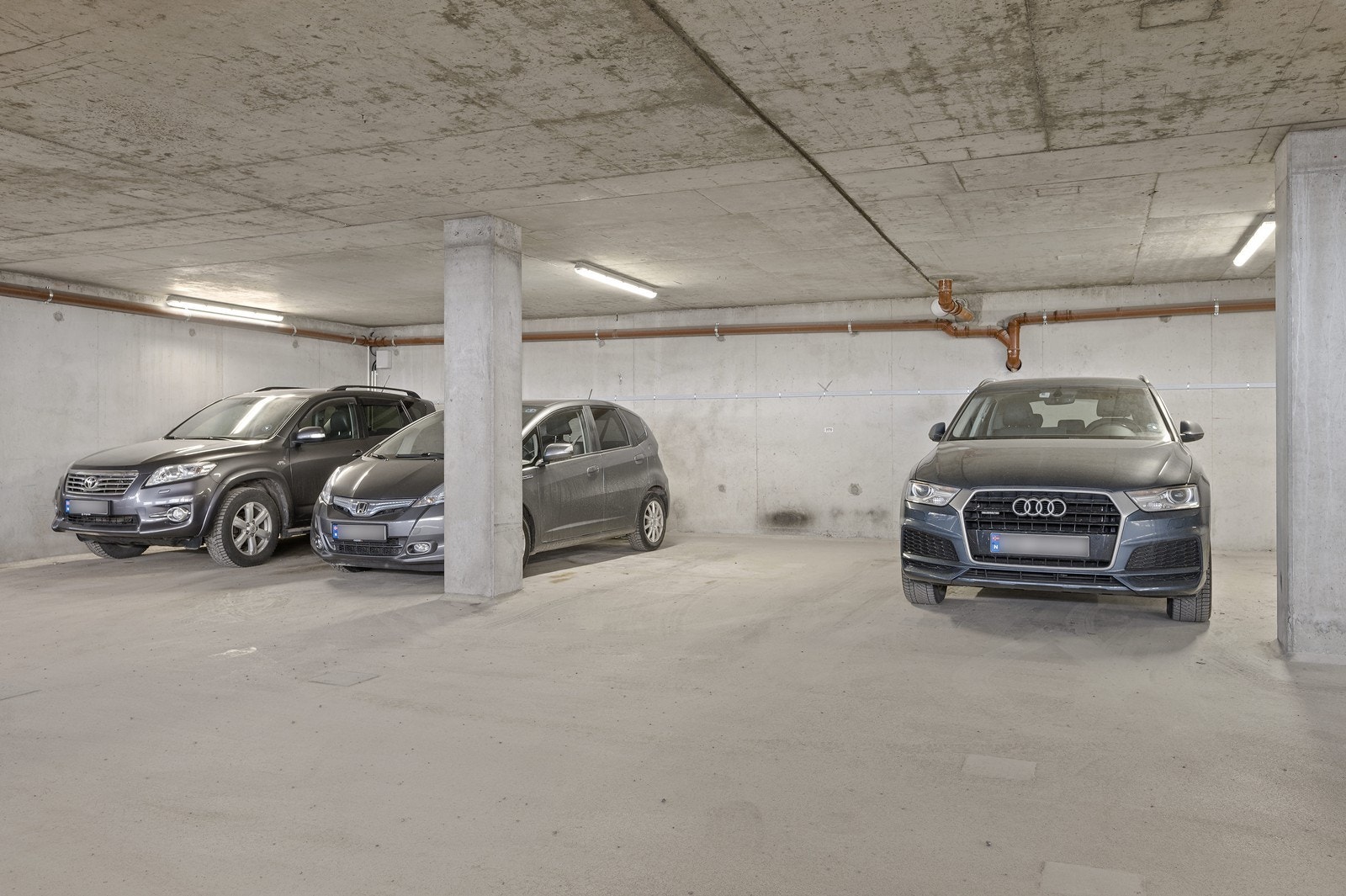 Parkeringsplass i felles garasjeanlegg - mulighet for elbillader på egen parkeringsplass Galleribilde