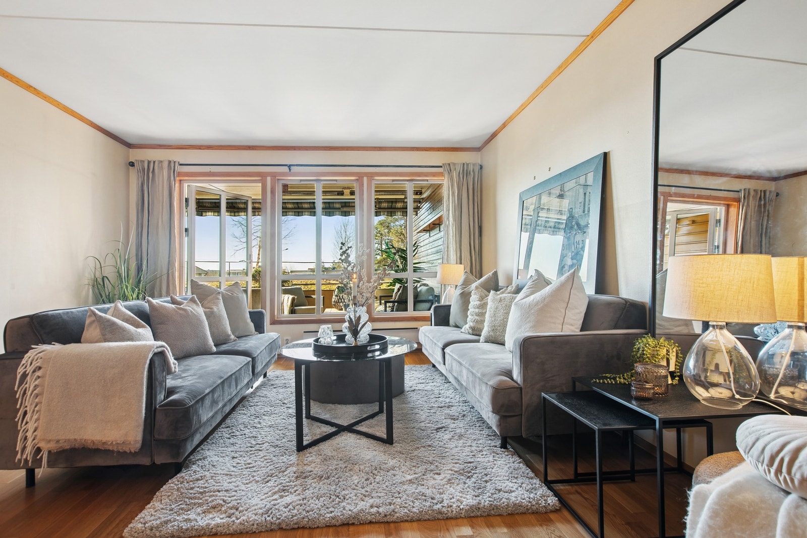 Her får du en lys og koselig stue. Galleribilde