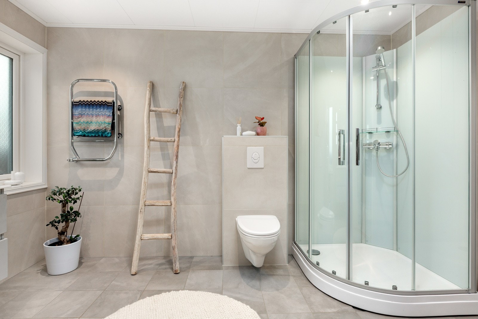 Det er deilig gulvarme på badet. Galleribilde