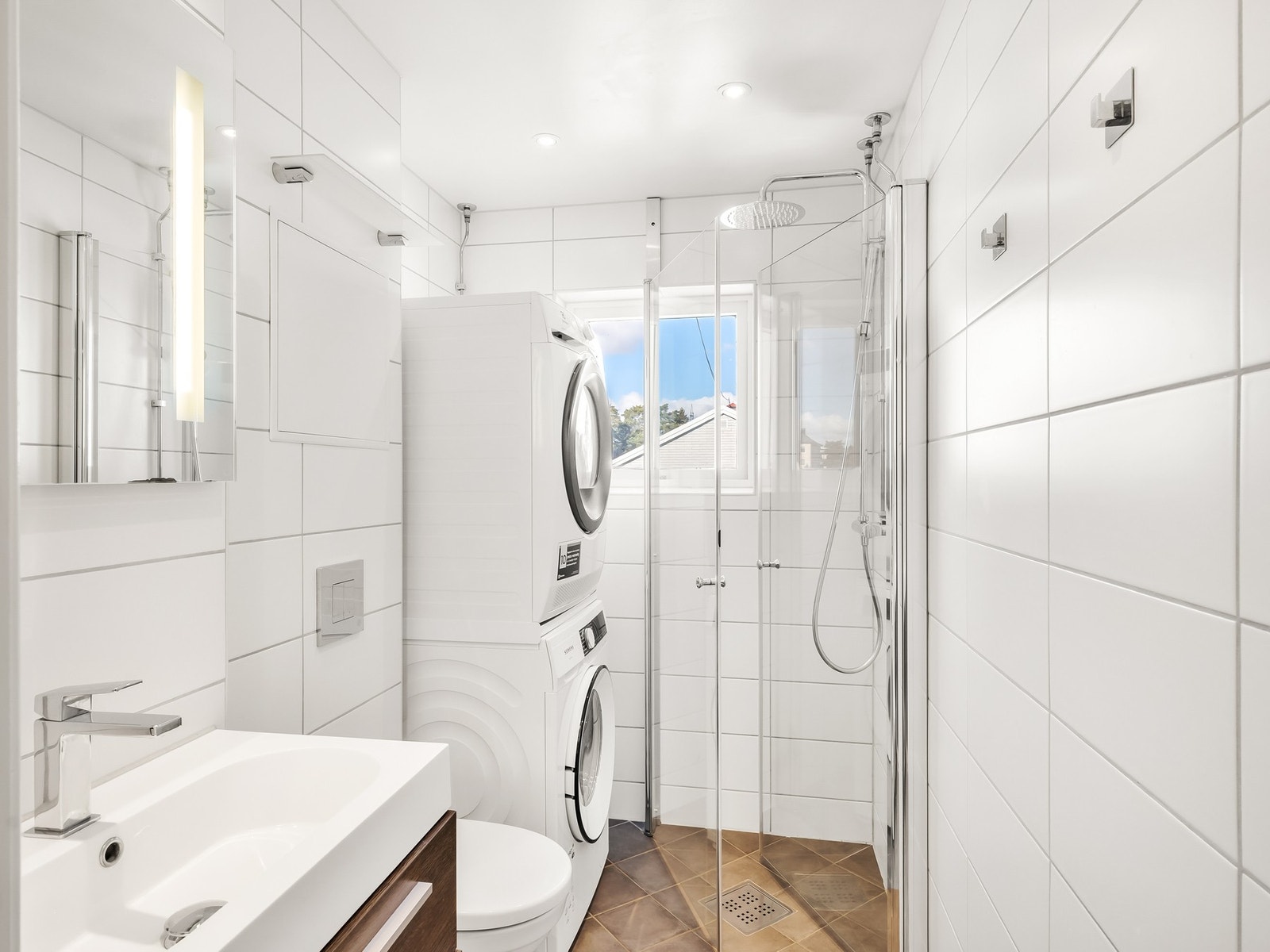 Det er god plass til både vaskemaskin og tørketrommel. Galleribilde