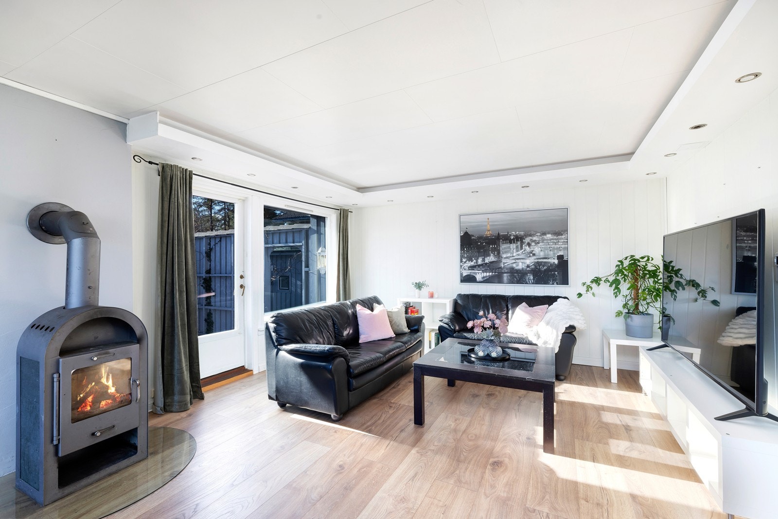 Her er en vedovn som gir varme og hygge Galleribilde