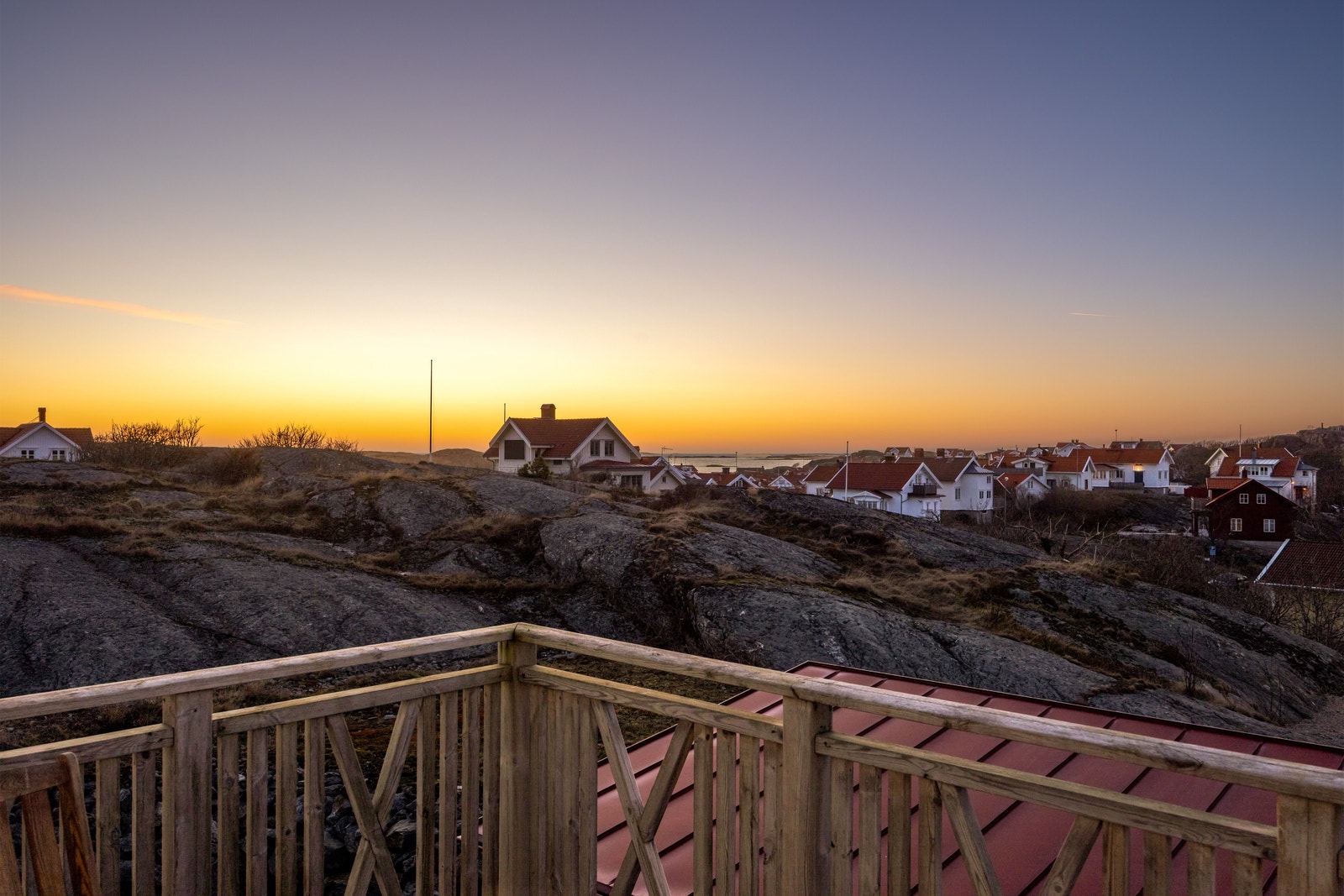 Se solnedgången från en av hemmets tre balkonger Galleribilde