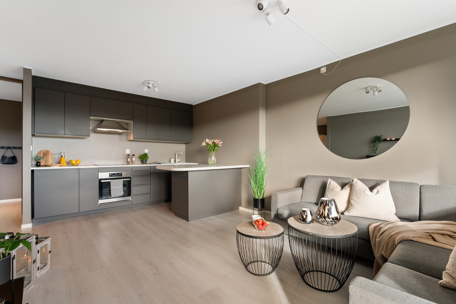 Behagelige og lyse farger gir leiligheten det lille ekstra Galleribilde