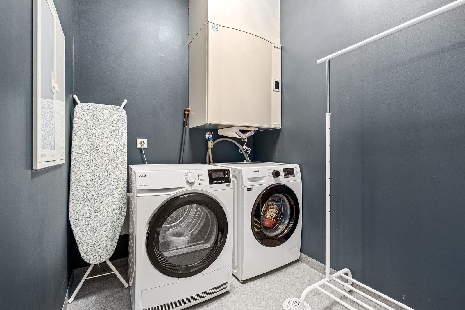 Det er eget vaskerom i leiligheten. Galleribilde
