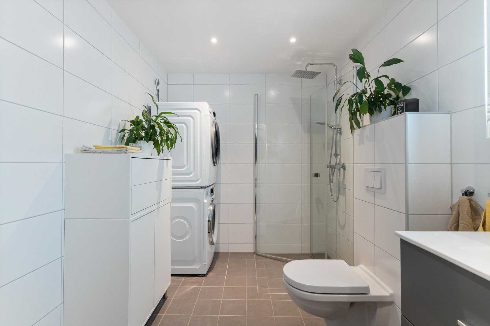 Det er opplegg for både vaskemaskin og tørketrommel. Galleribilde