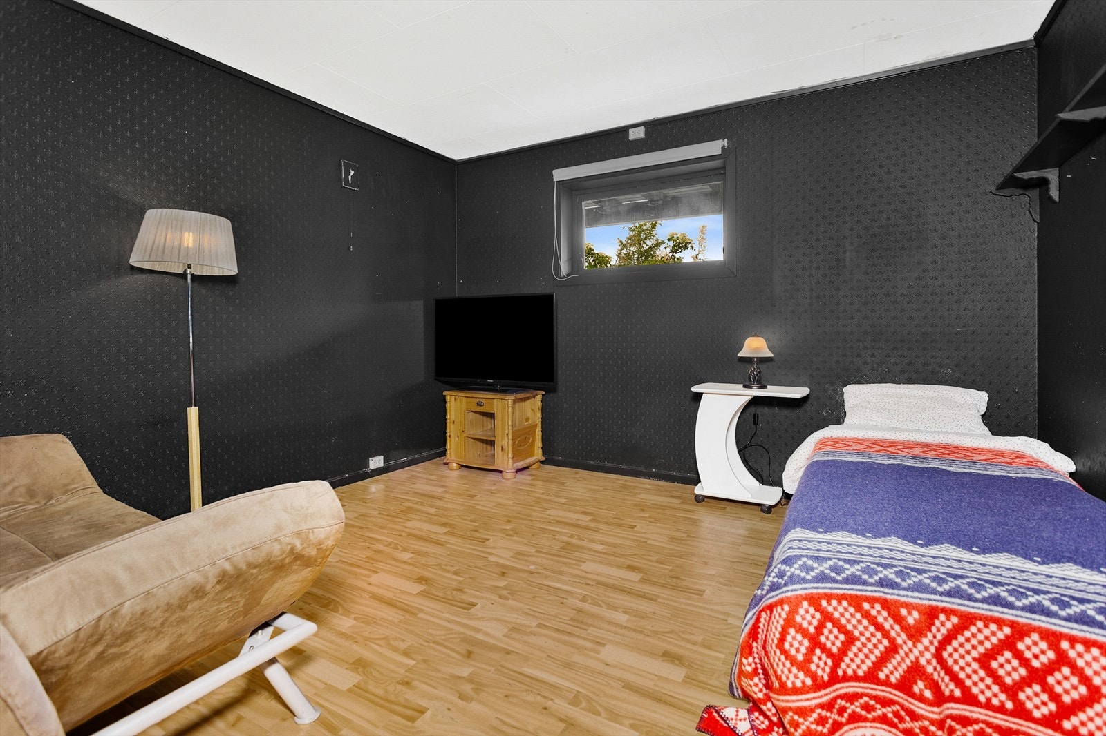 Dette rommet har blitt brukt både som TV stue, trimrom og oppholdsrom Galleribilde