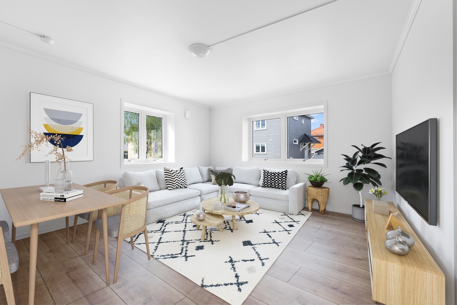 Leiligheten har en koselig stue med god plass for sofagruppe, tv-møblement og spisebord. Stuen har laminatgulv og vegger malt i en lys, nøytral farge. Dette gjør det lettere å sette sitt personlige preg på rommene gjennom pynt og interiør. Galleribilde