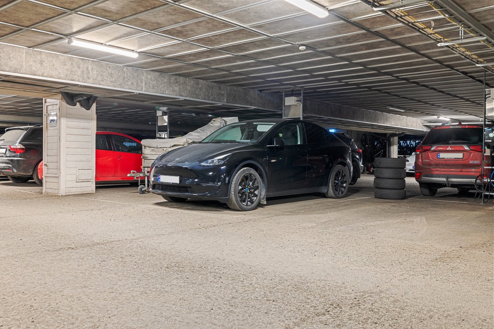 Med leiligheten følger garasjeplass i fellesanlegg med lader til elbil. Galleribilde