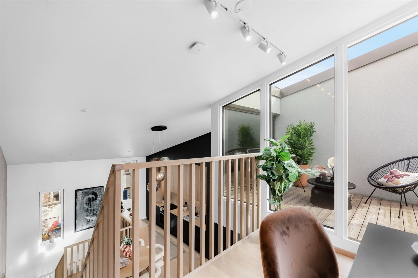 I 3. etasje finner du en svært praktisk mesanin som gir ekstra funksjonalitet og utnyttelse av boligens areal. Galleribilde