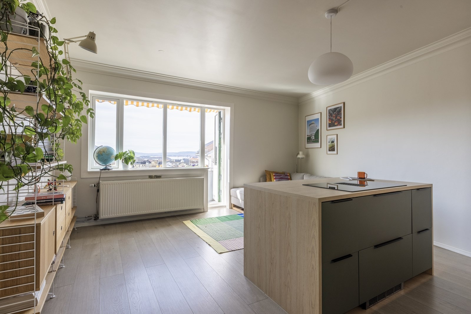 En lekker kjøkkenøy gir både ekstra oppbevaring samt skaper en sosial sone. Galleribilde