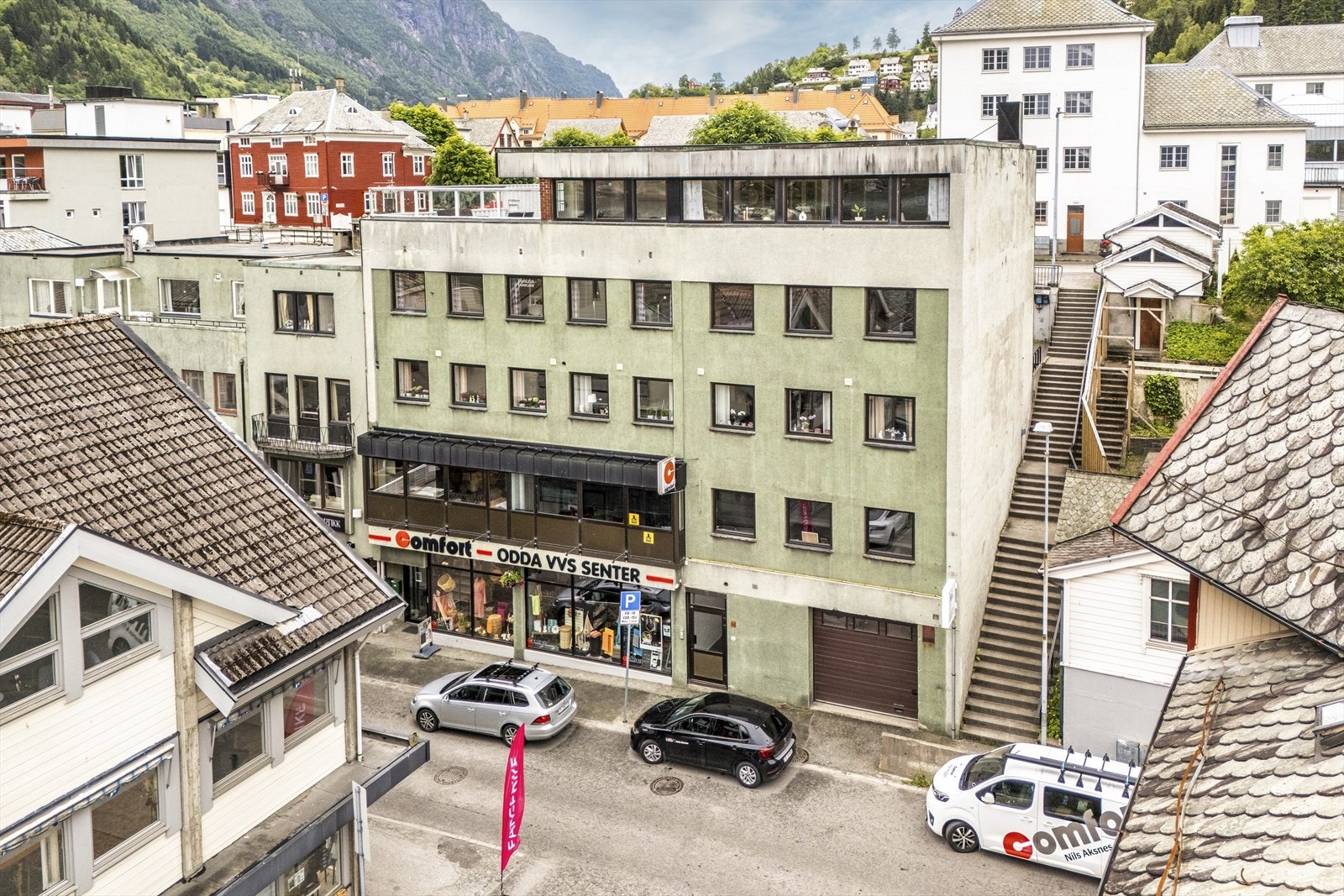 Sentrumsbygård (Odda VVS Eiendom) med butikk, kontor og leiligheter til salgs Galleribilde