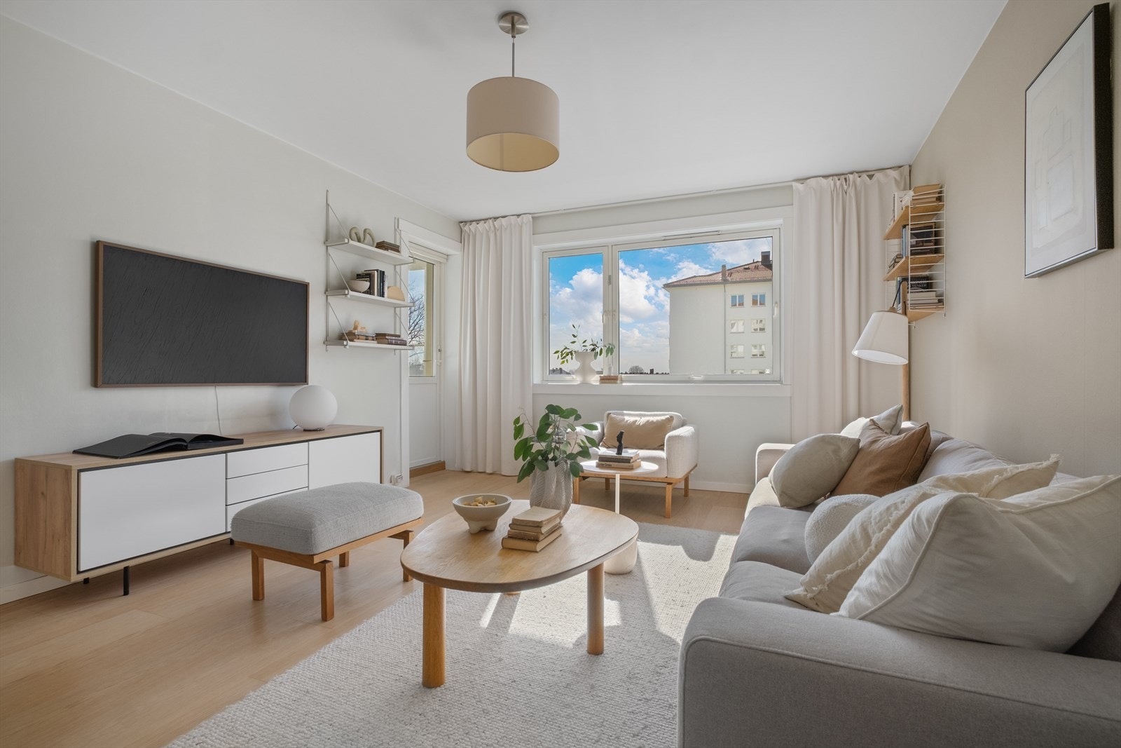 En lys og arealeffektiv 3-roms andelsleilighet med en romslig stue Galleribilde