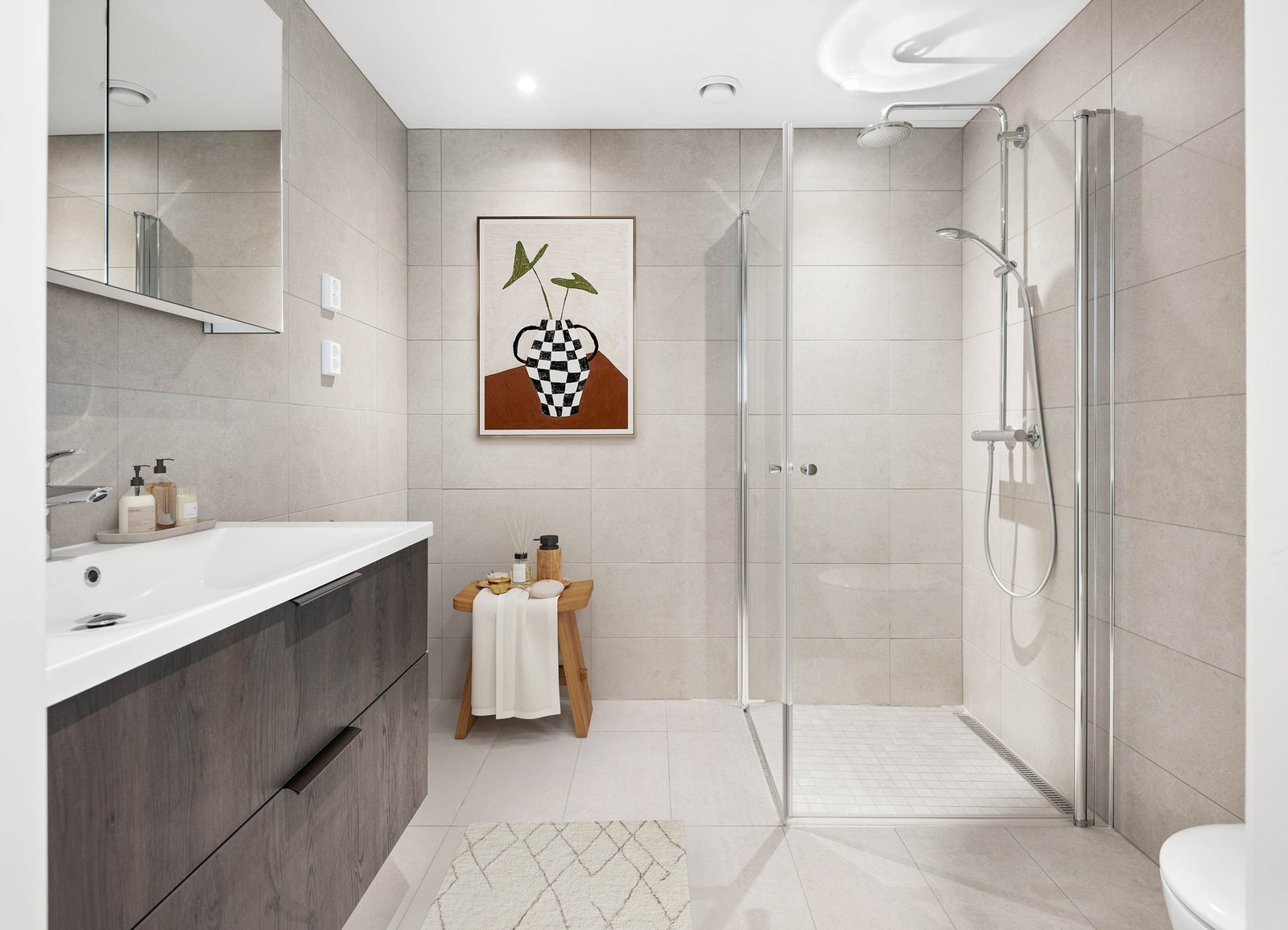 Hovedbadet har opplegg for vaskemaskin og tørketrommel. Galleribilde