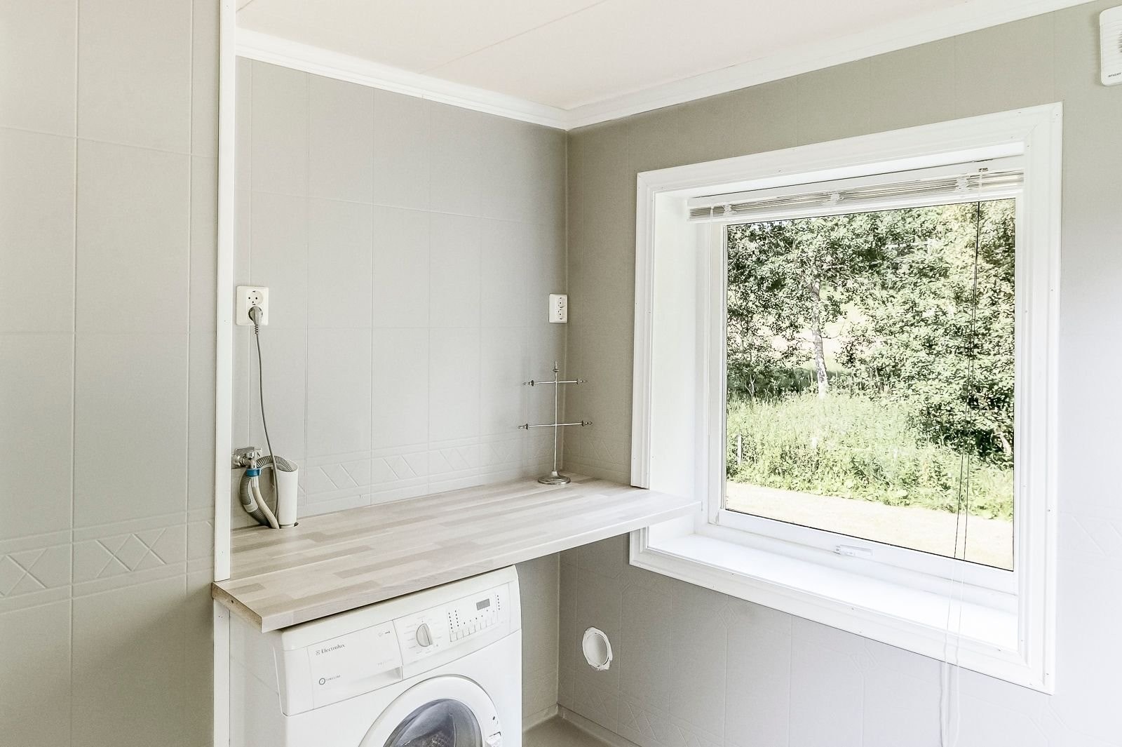 Opplegg for vaskemaskin på bad Galleribilde