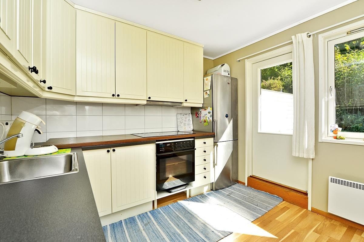 Kjøkken med utgang terr. og hage Galleribilde