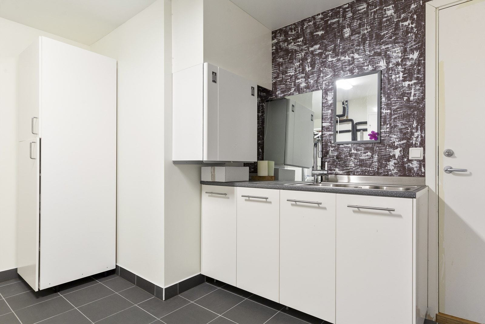 I sokkeletasjen disponerer hovedenheten et stort vaskerom. Galleribilde