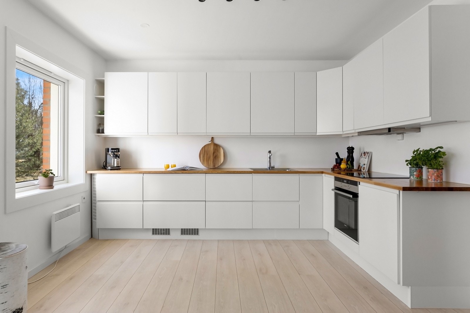 Åpen løsning som gir en god og romslig romfølelse Galleribilde