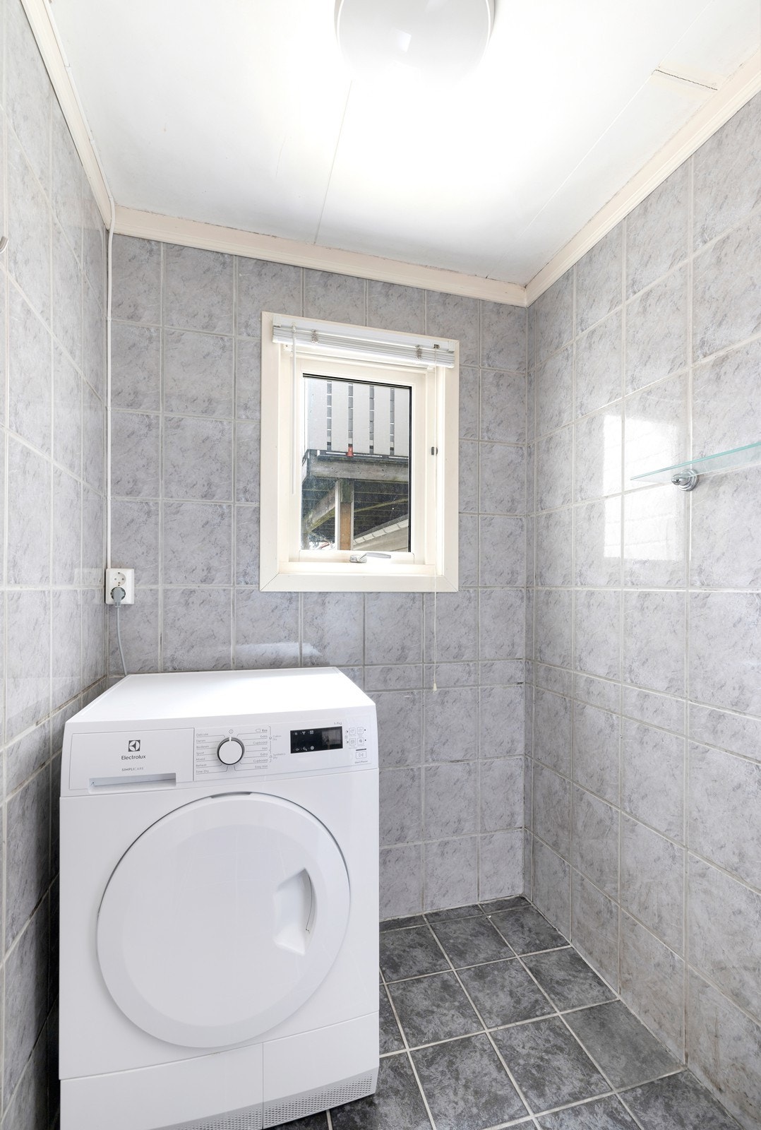 Praktisk vaskerom ved badet Galleribilde