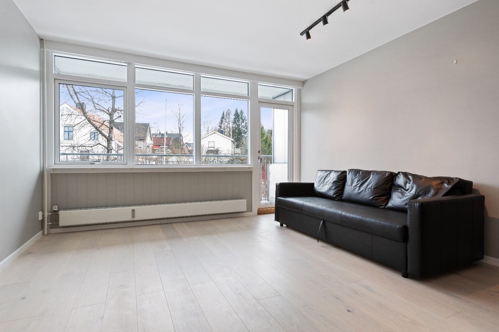 Oppholdsrom med sentraloppvarming Galleribilde