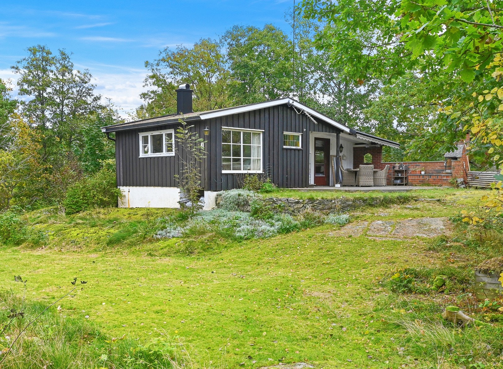 Tuteråsen 3 er en eldre fritidsbolig på ett plan beliggende i Larkollen. Galleribilde