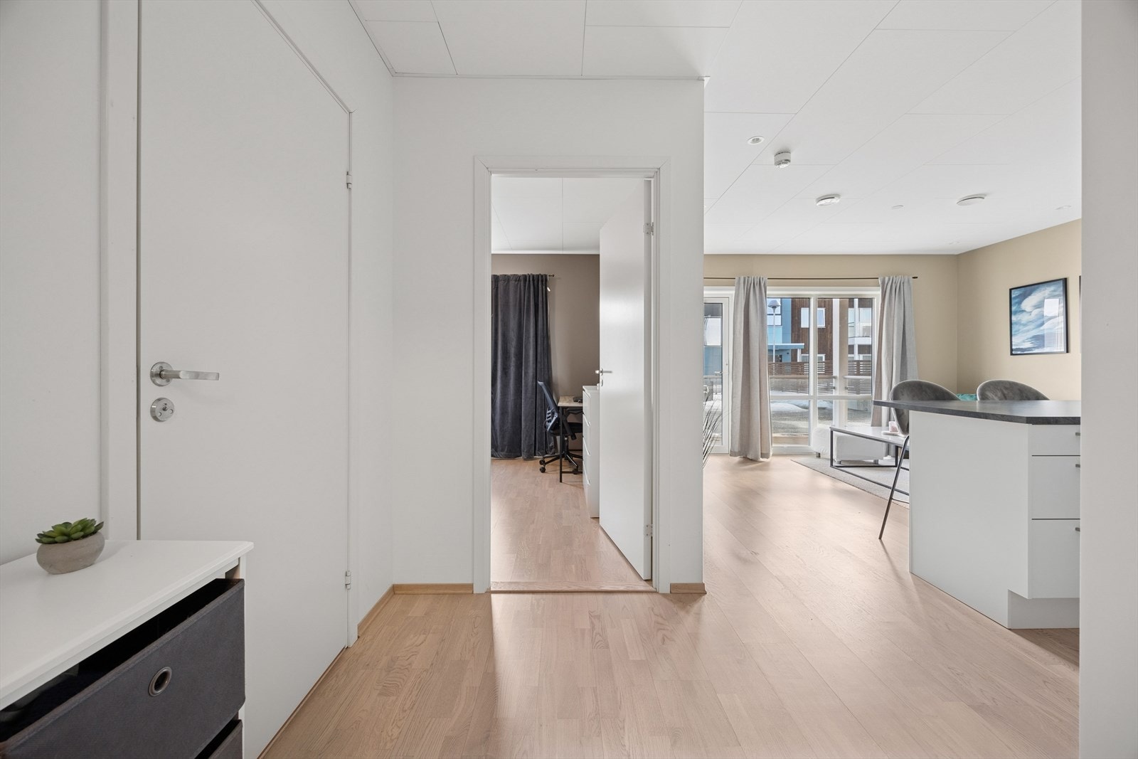 Denne leiligheten ligger i byggets første etasje. Galleribilde