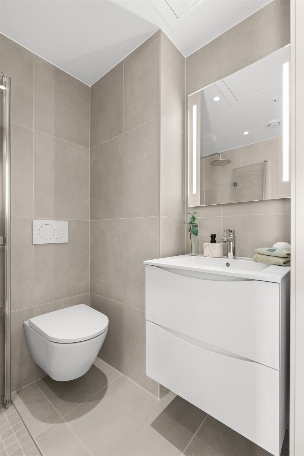 Begge badene har varmekabler i gulvet for ekstra komfort. Galleribilde