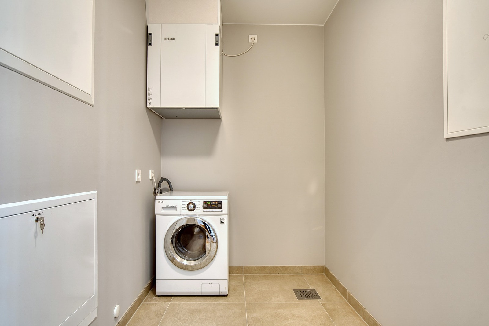 I leiligheten finner du også et praktisk vaskerom Galleribilde