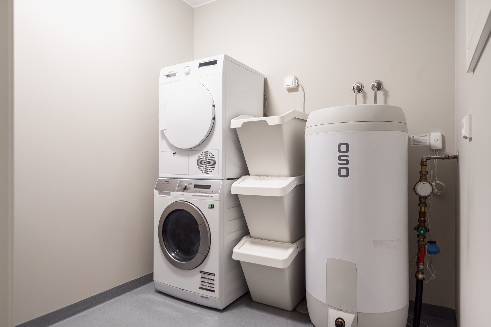 Praktisk separat vaskerom som kan ses på som en nødvendig gode for barnefamilier. Galleribilde