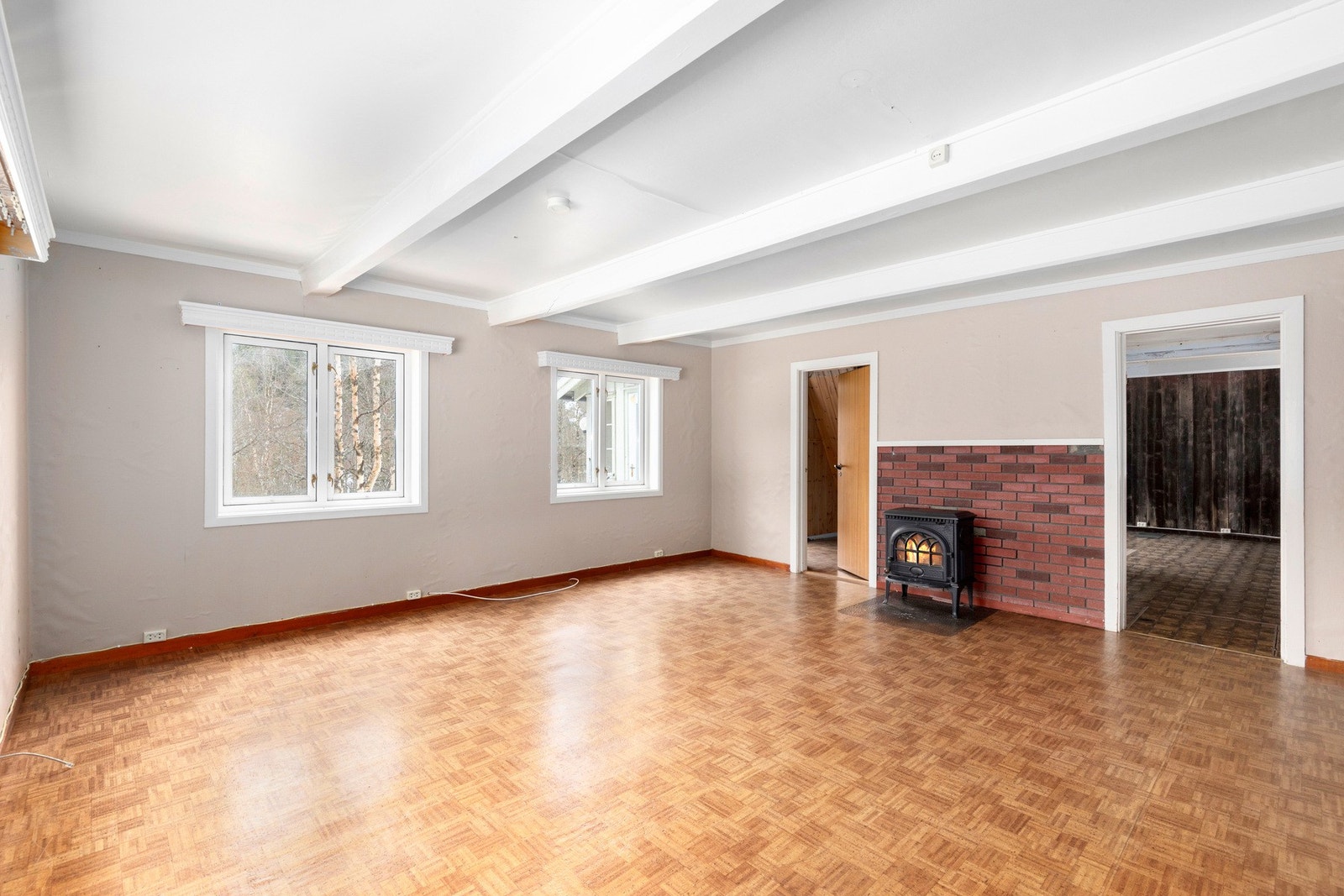 I 1.etasje finner du en romslig stue på 24 kvm. Galleribilde