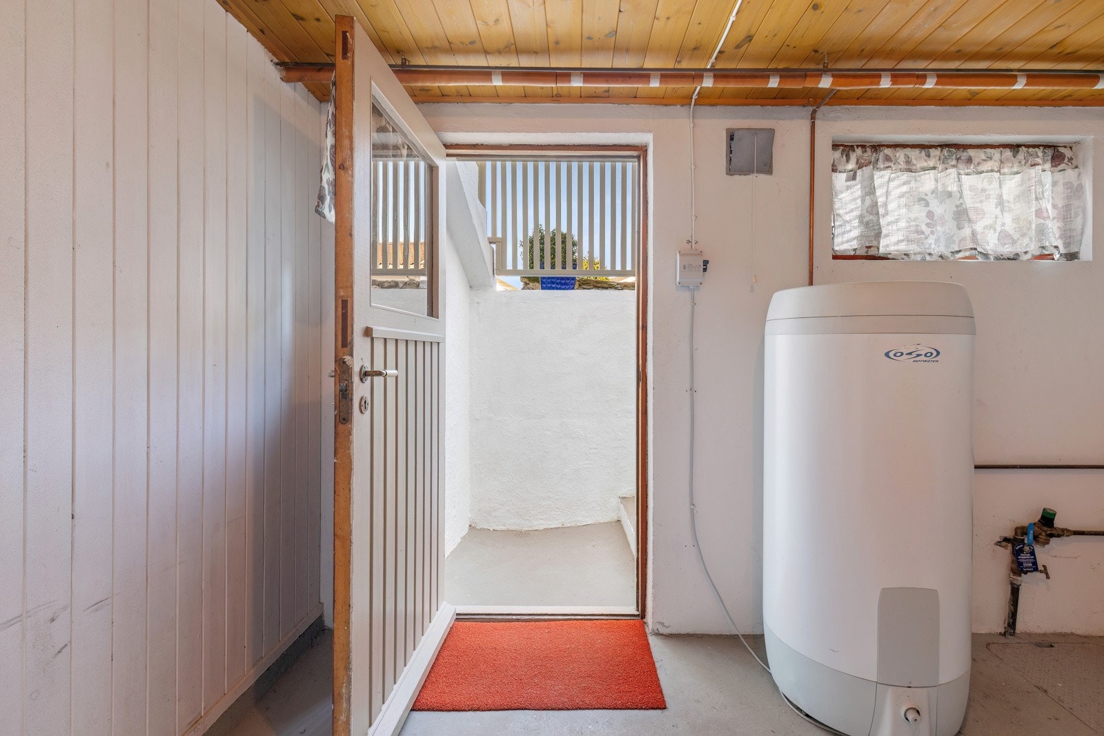 Egen utgang til hagen fra vaskekjelleren Galleribilde