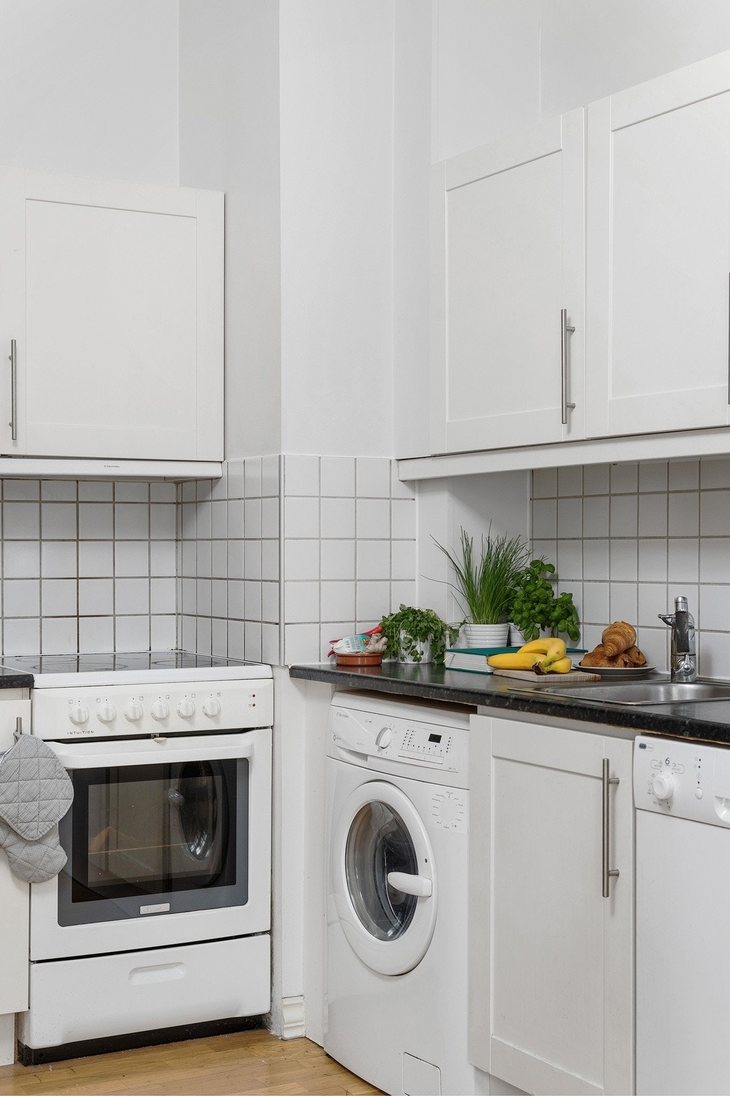 Opplegg for vaskemaskin på kjøkkenet. Galleribilde