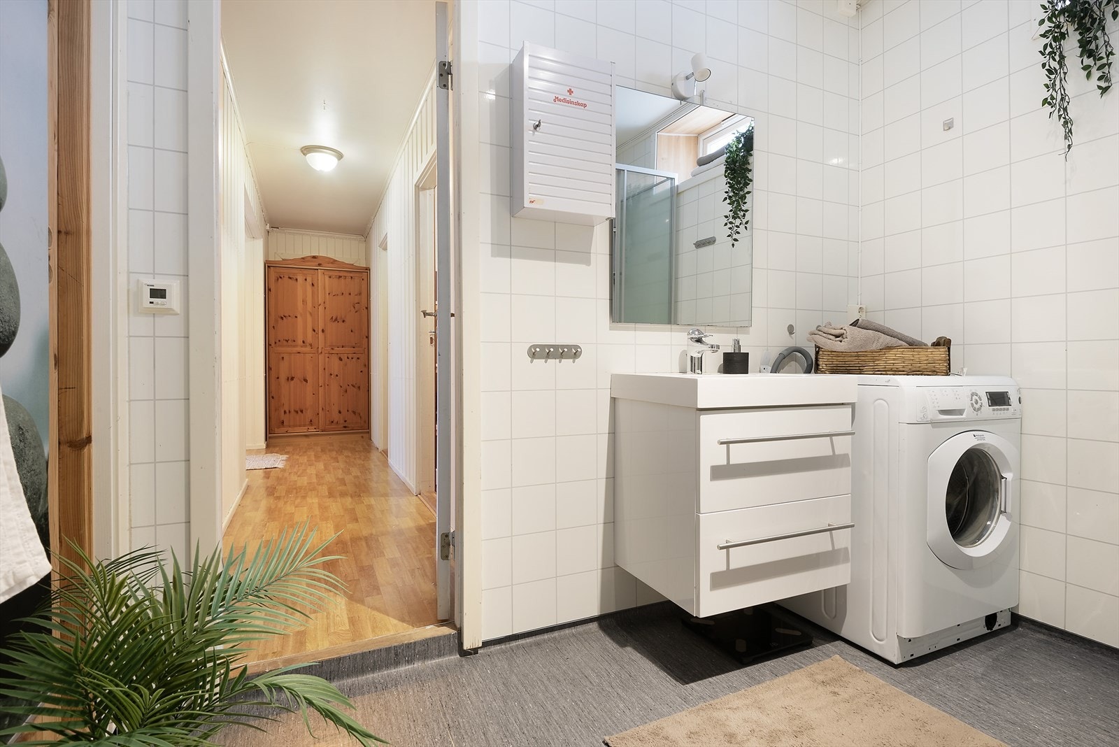 Badet har opplegg for vaskemaskin. Galleribilde