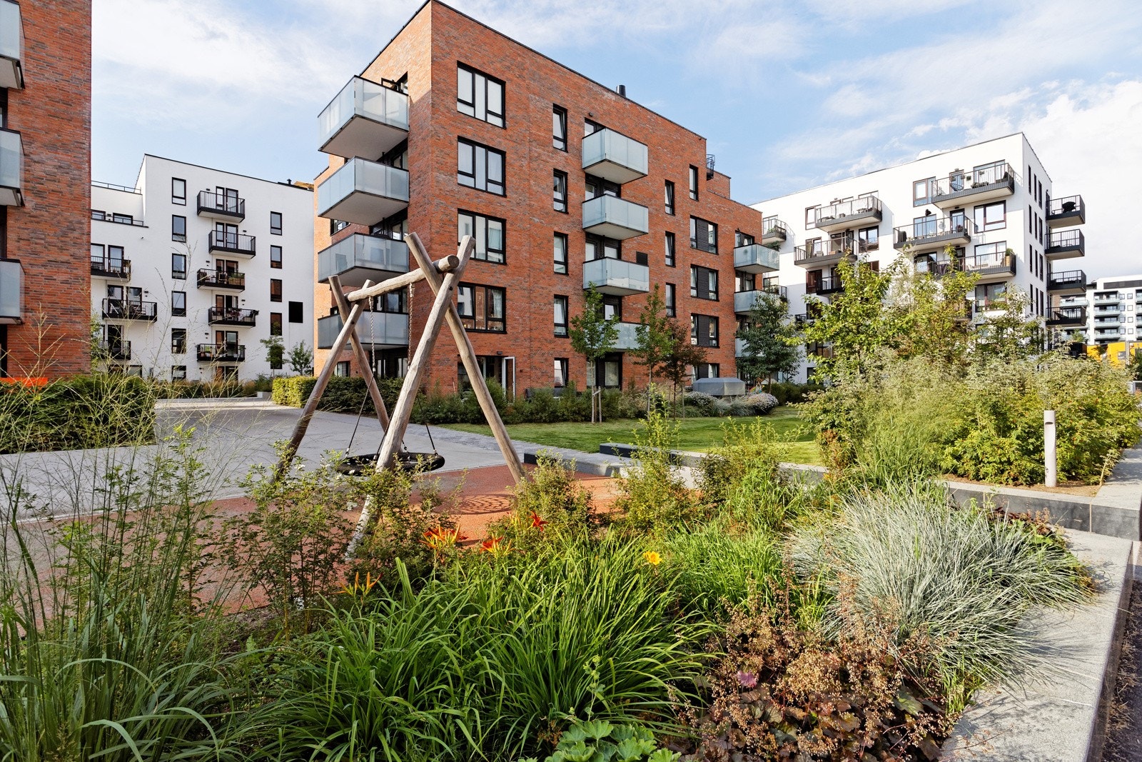 Området er barnevennlig med store bilfrie områder og lekeplasser Galleribilde