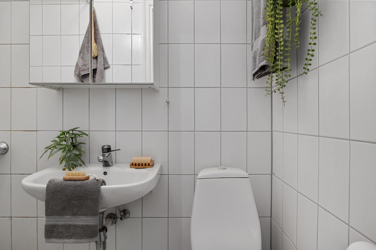 Helfliset bad med gulvvarme Galleribilde