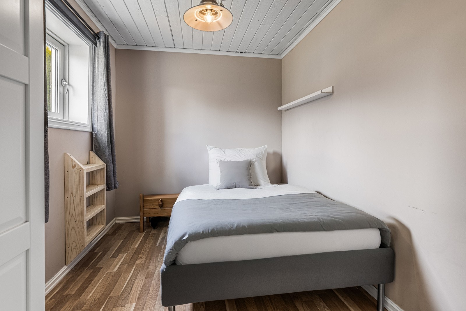 Det fjerde soverommet finner man i underetasjen. Galleribilde