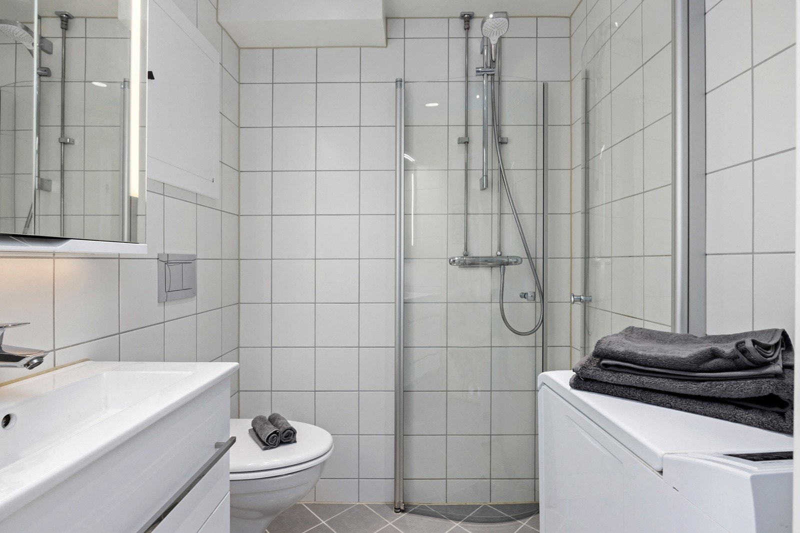 Pent flislagt bad i regi borettslaget Galleribilde