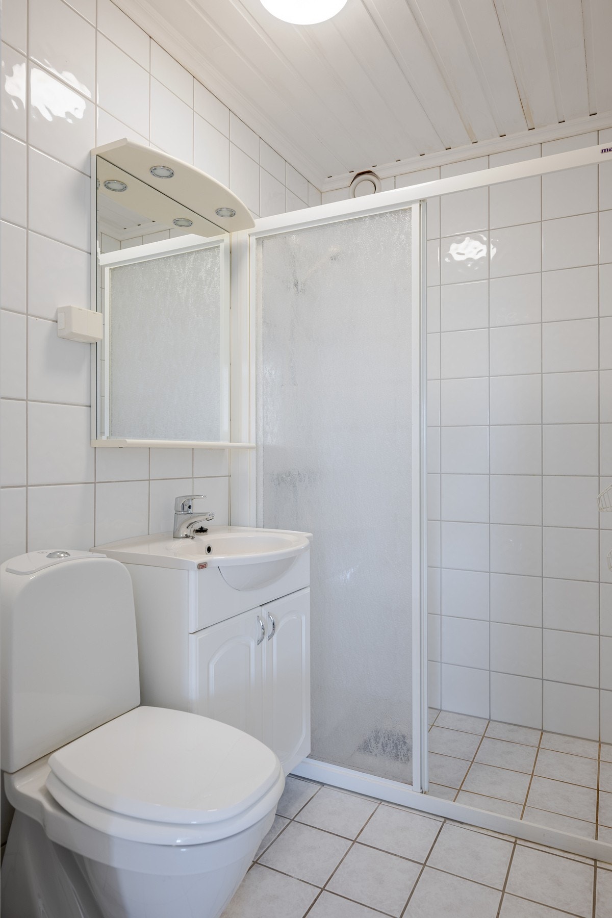 Flislagt bad med gulvvarme. Galleribilde