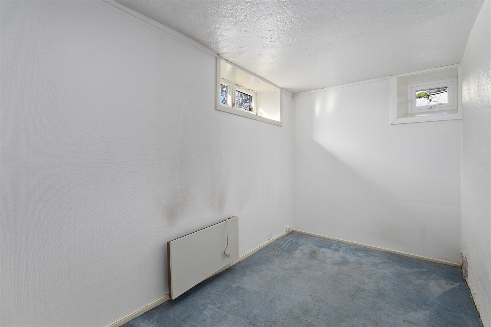 Boligen har rikelig med lagringsplass. I kjelleretasjen er det hele tre boder Galleribilde