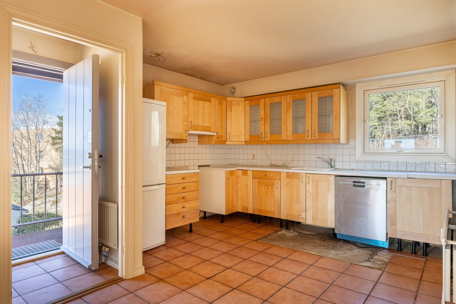 Leiligheten har adkomst via eget inngangsparti på baksiden. Galleribilde