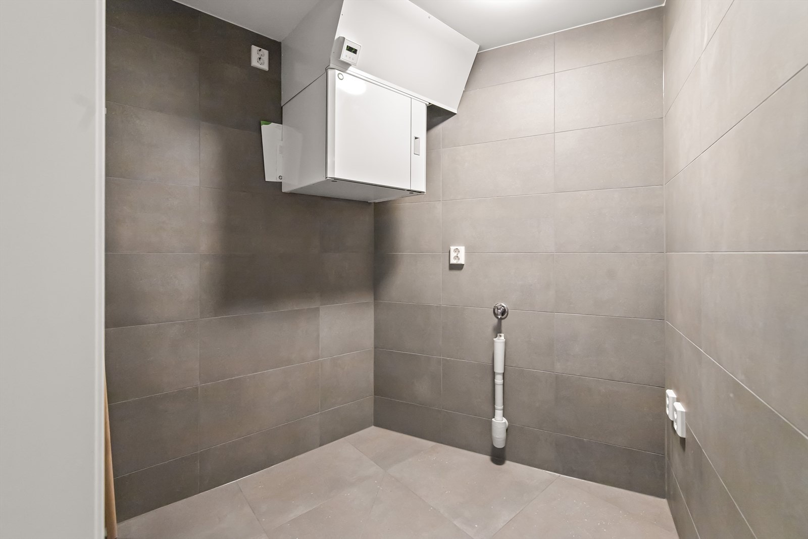 Vaskerommet ligger i flukt med baderommet. Her er det god plass til både vaskemaskin og tørketrommel. Galleribilde