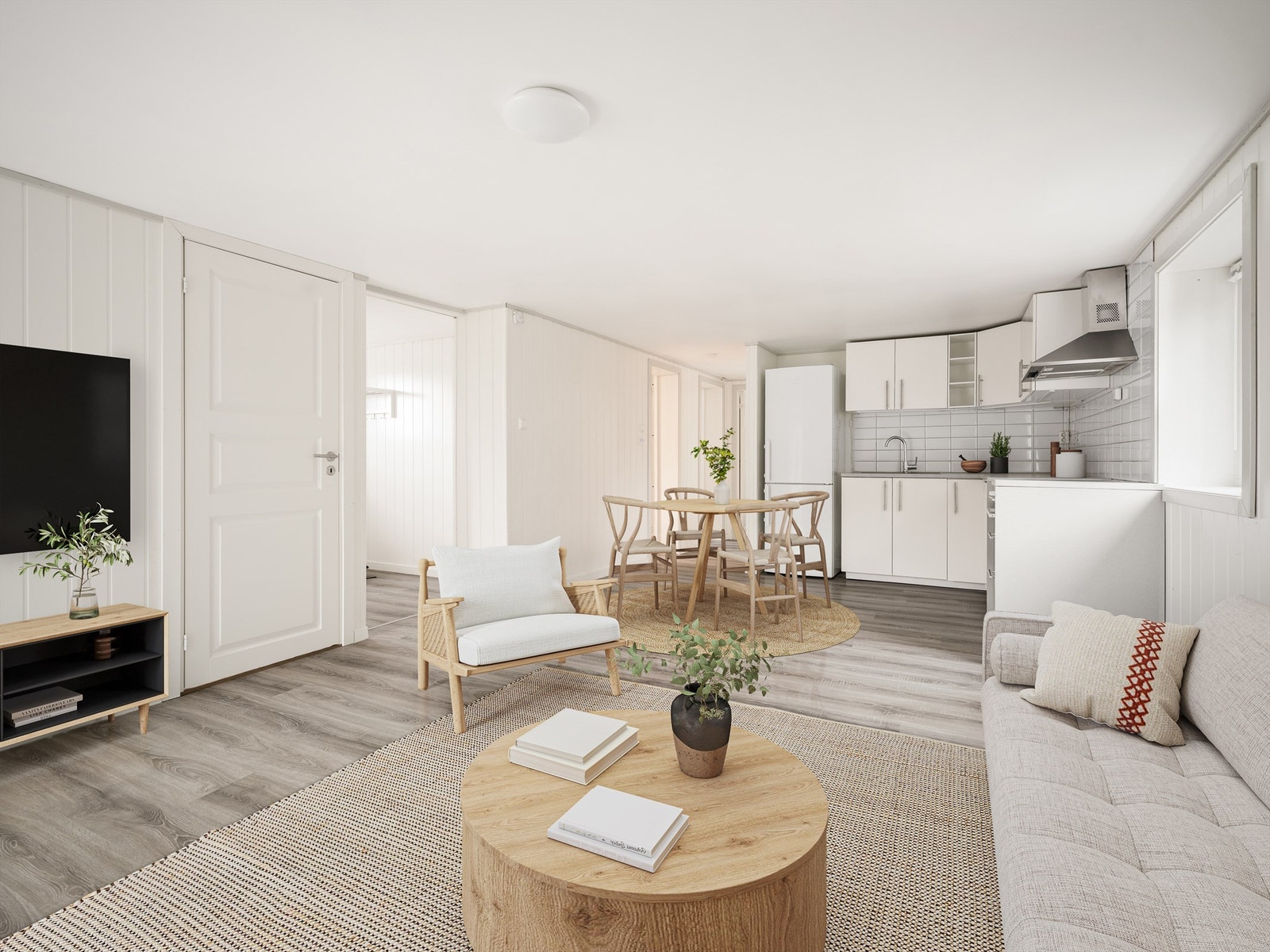 Sekundærboligens areal er effektivt disponert, blant annet med stue og kjøkken i åpen løsning. Bildet er digitalt møblert. Galleribilde