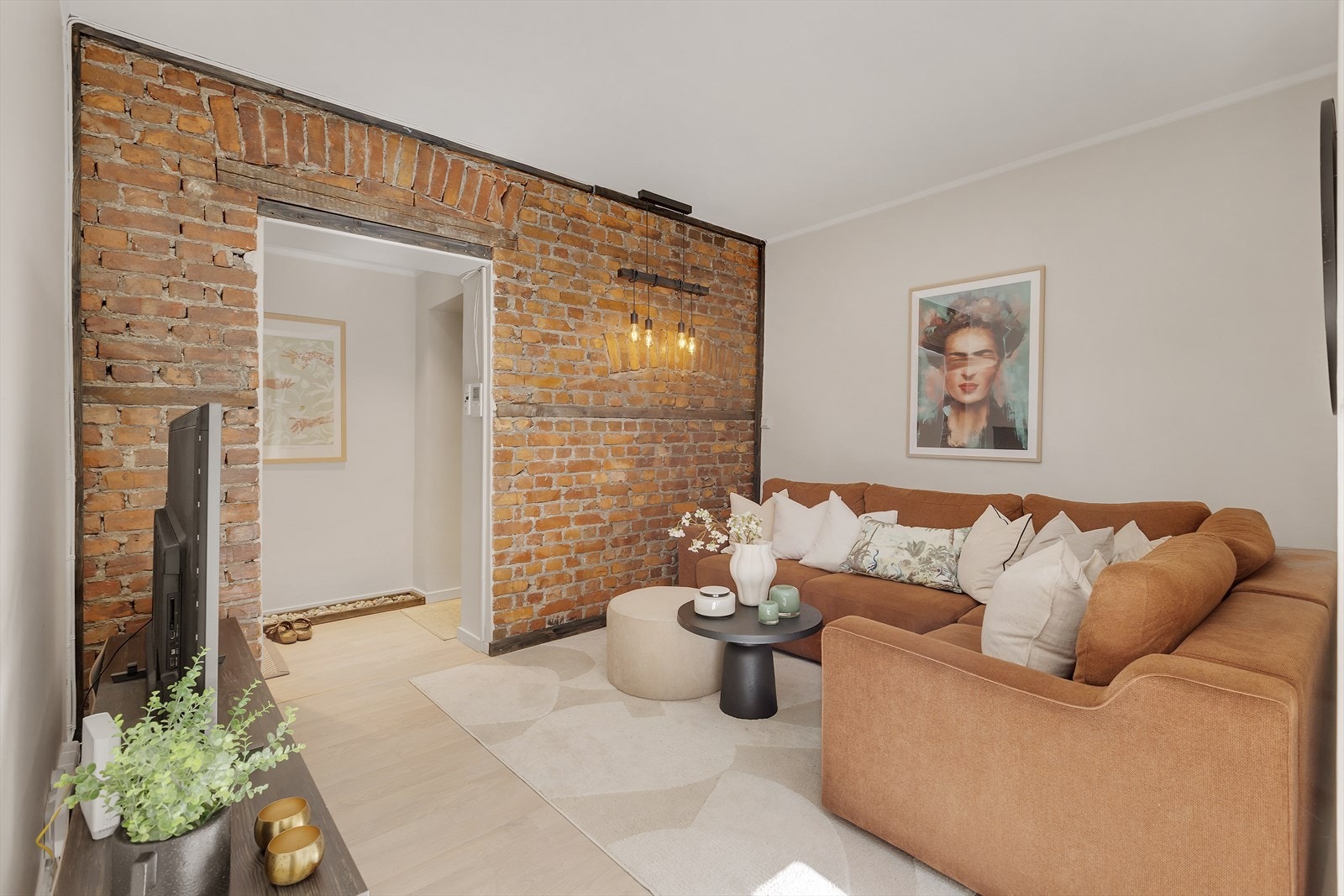 Lys og innbydende stue. Galleribilde