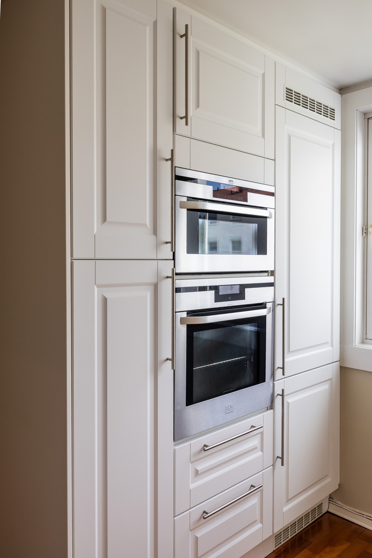 Integrerte hvitevarer gir kjøkkenet et godt helhetsuttrykk. Galleribilde