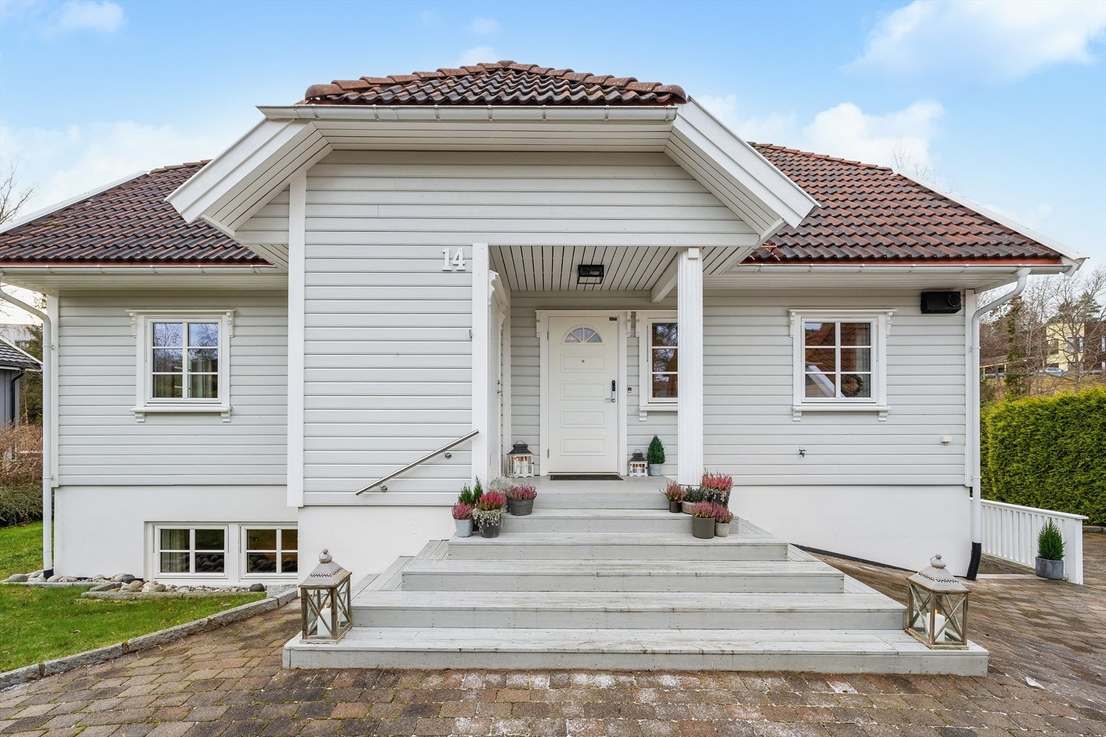 Et hyggelig inngangsparti ønsker deg velkommen hjem Galleribilde