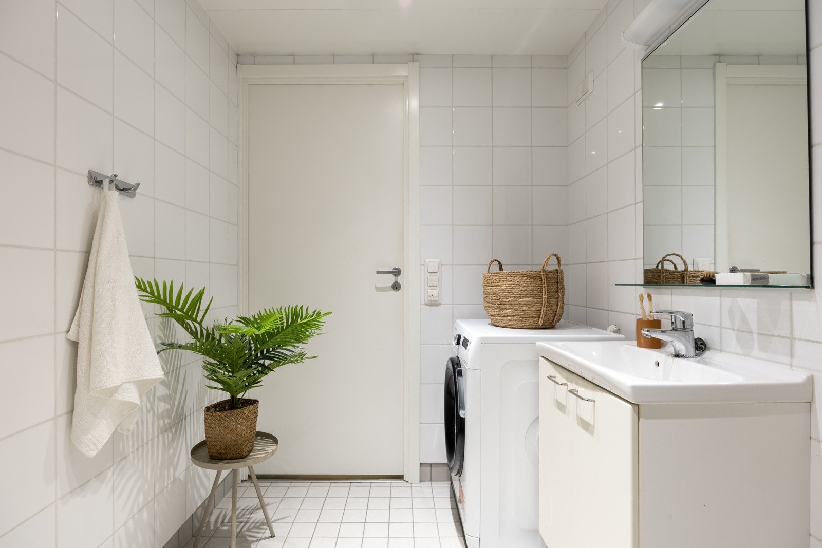 Badet har opplegg for vaskemaskin. Galleribilde