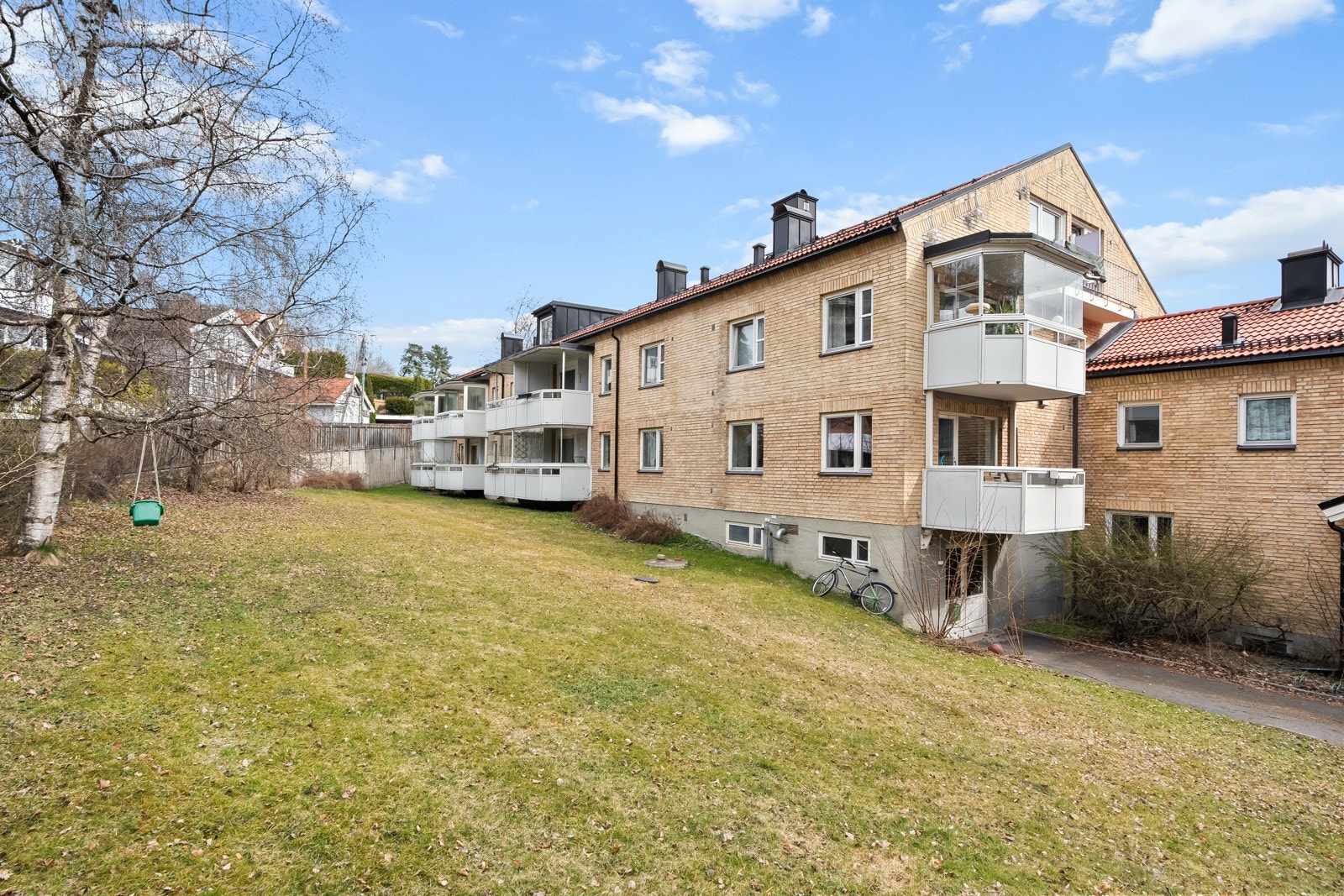 Grøntarealer rundt boligen som kan benyttes av beboerne Galleribilde