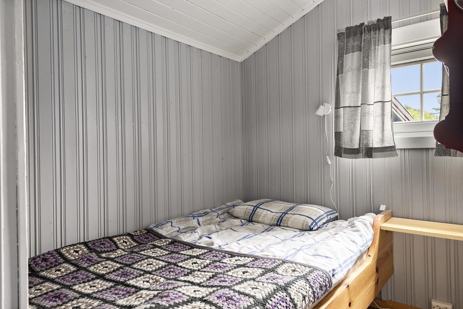 Soverommet tilhørende denne delen er koselig med sengeplass til én person. Galleribilde