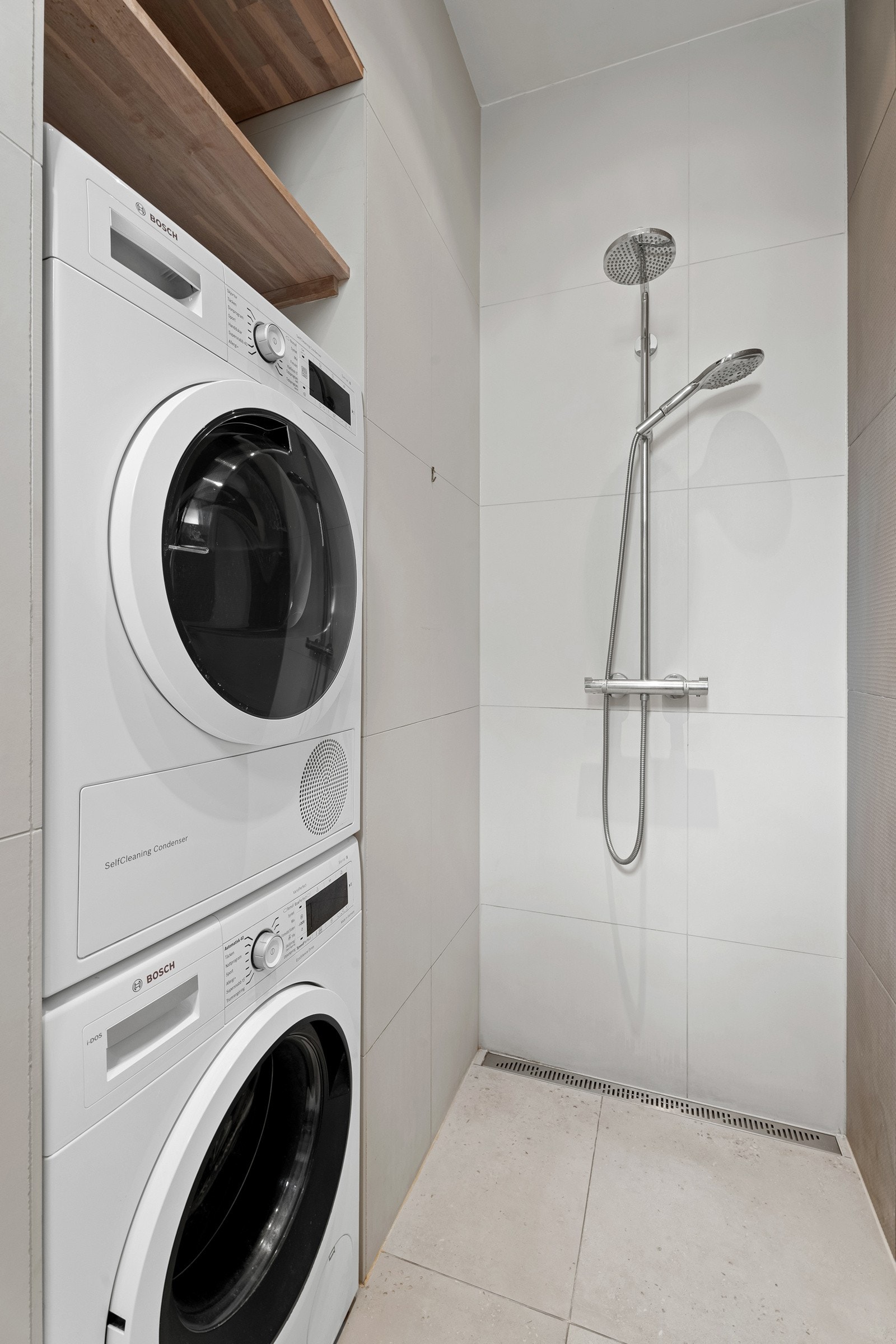 Praktisk nisjeløsning til vaskemaskin og tørketrommel. Galleribilde